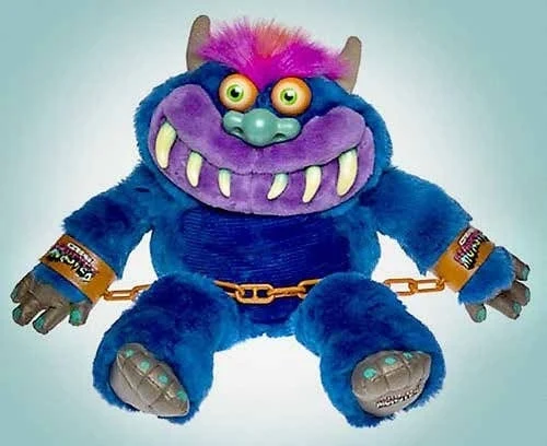Colorful purple monster plush with detailed accessories from Bigshot Toyworks’ portfolio.